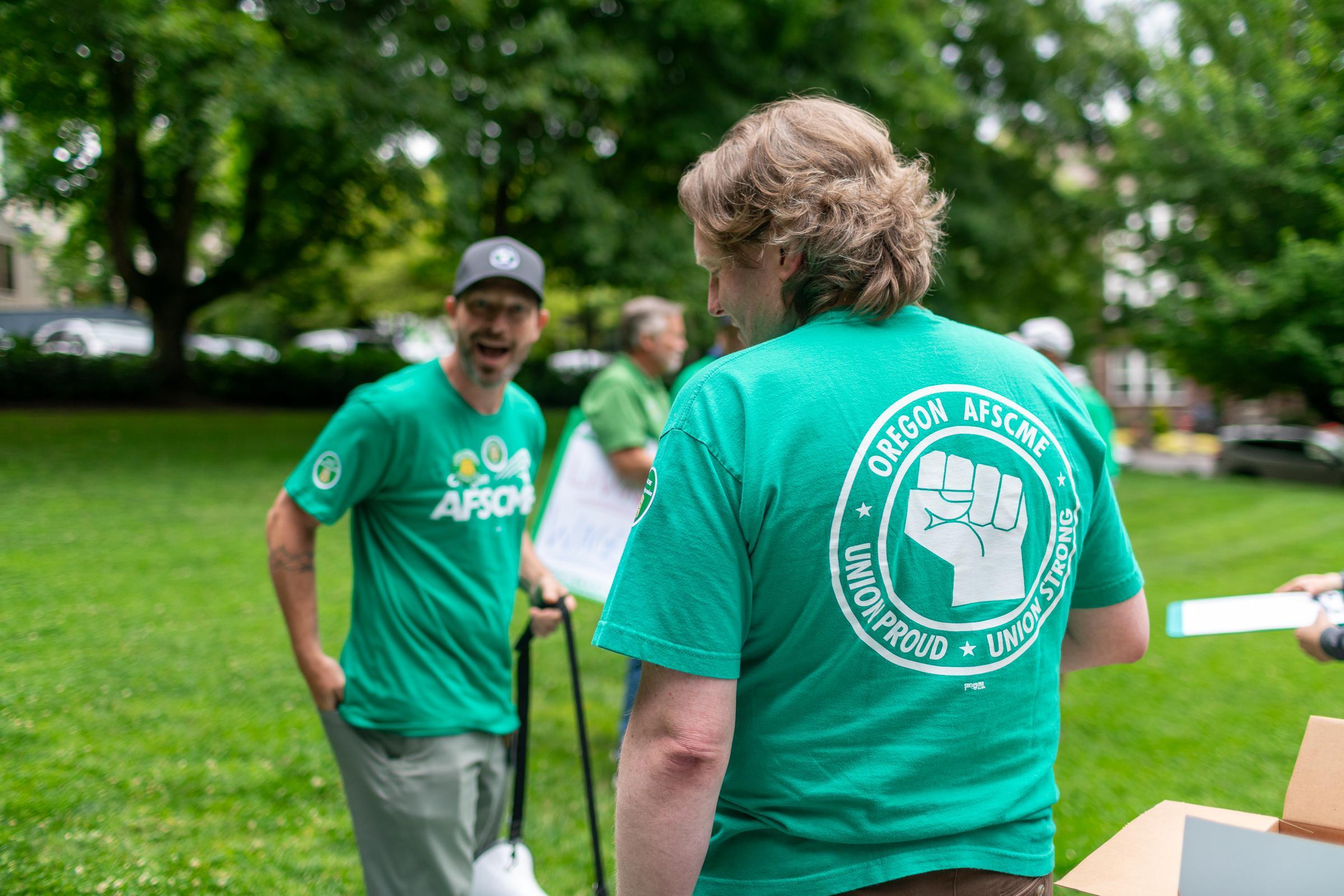 Oregon AFSCME Union Member in Green Shirt